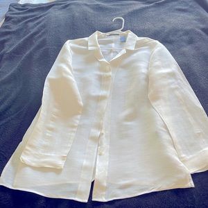 White sheer button up shirt.
